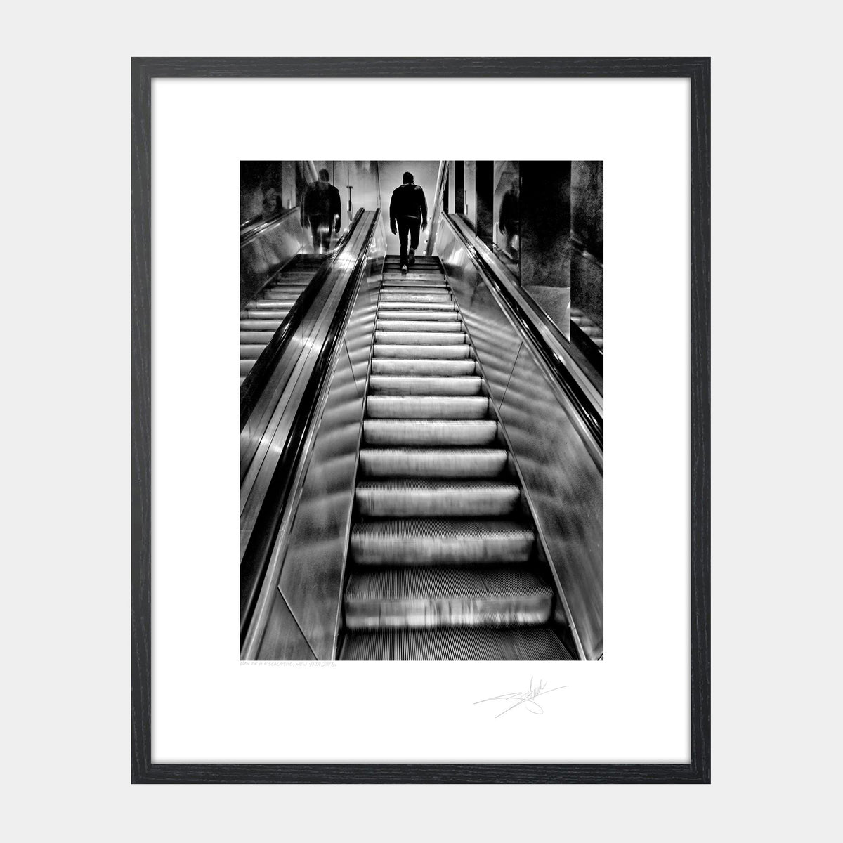 Man on Escalator