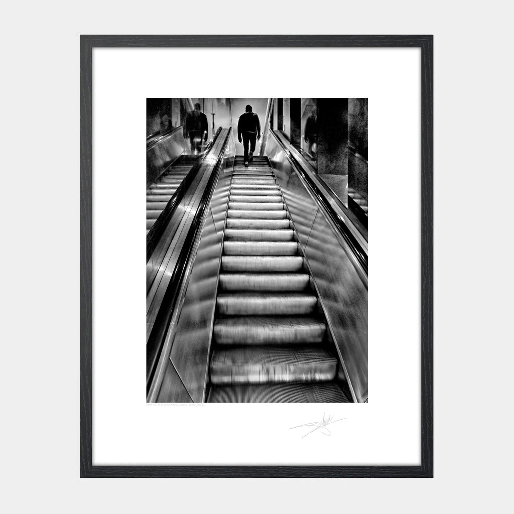 Man on Escalator