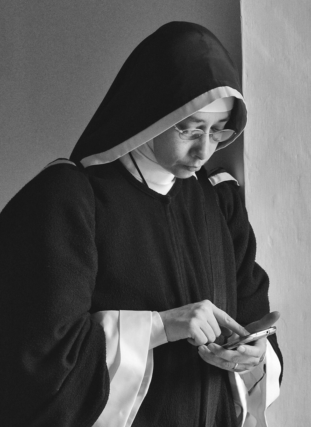 Nun with a phone