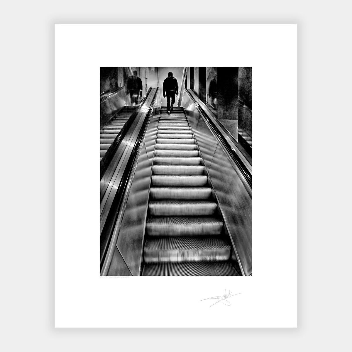 Man on Escalator