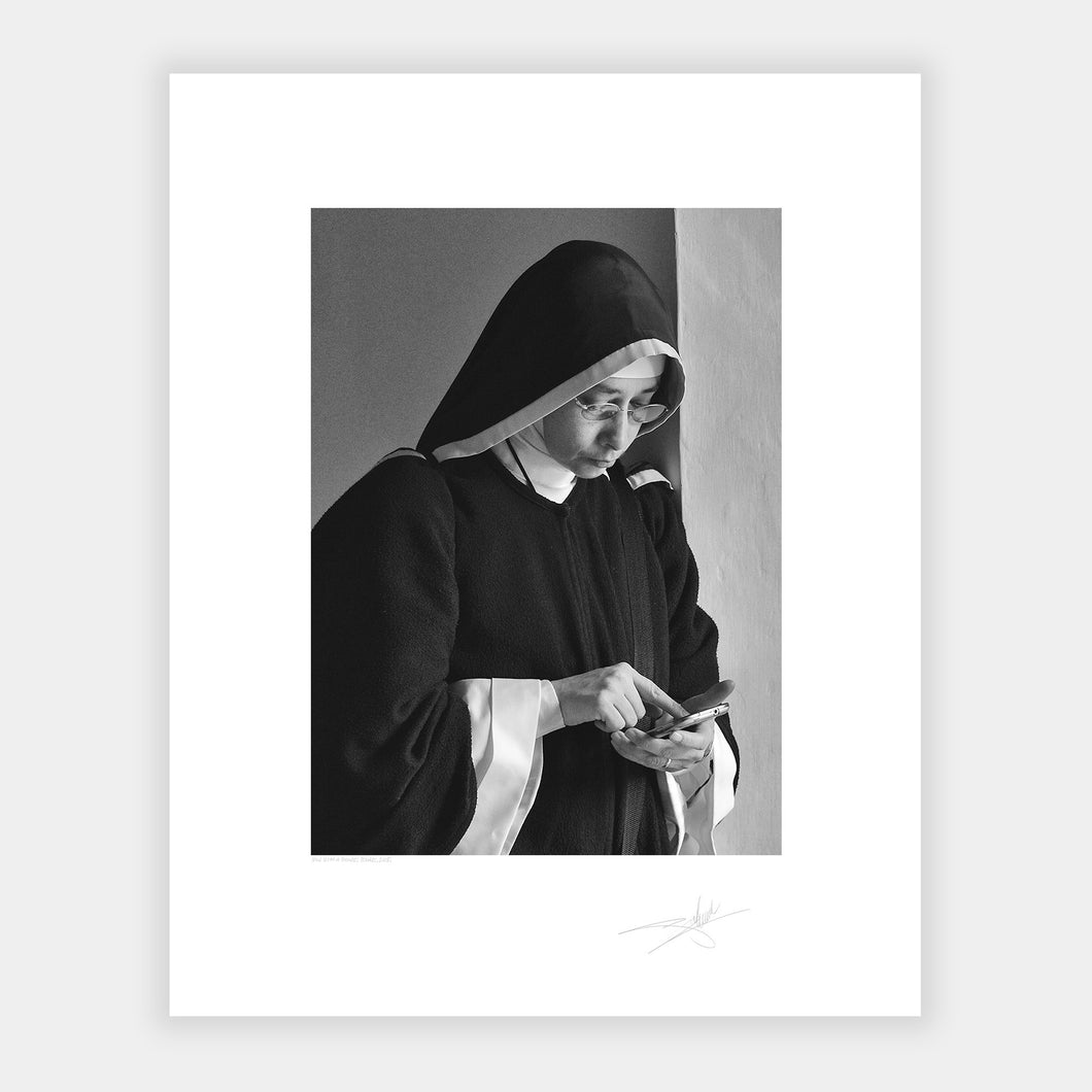 Nun with a phone